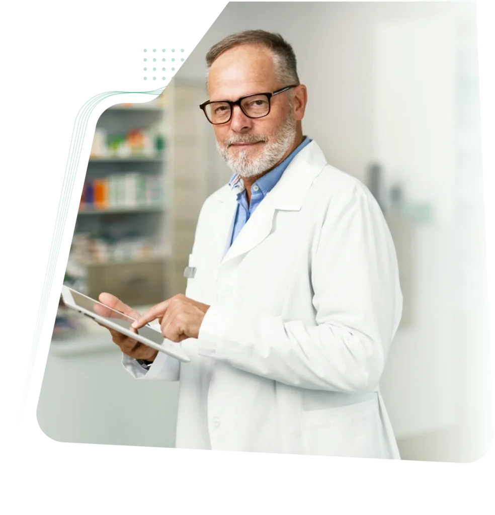 Healthcare provider reviewing patient records on a tablet